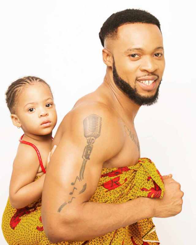 Flavour backing his daughter Sophia.
